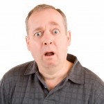 A modular home contingency fund A man bug-eyed with surprise because he didn't have a modular home contingency fund